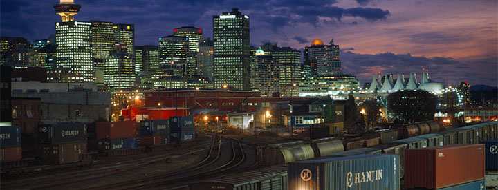 View of a CN train and Vancouver at night