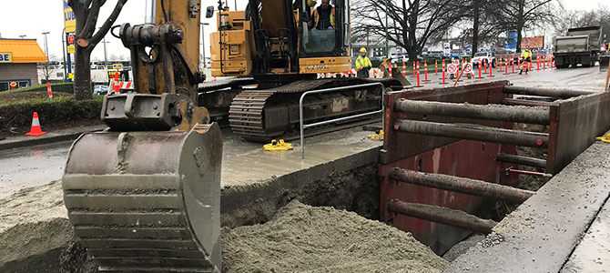 A digger at a sewer construction site 