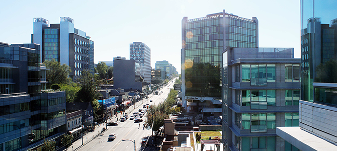 A view of West Broadway on a sunny day