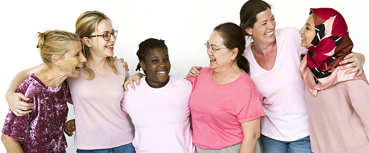 Six women standing in a row