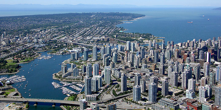 Aerial view of Yaletown and False Creek looking west towards Kitsilano, West Point Grey, and UBC