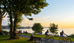 Cyclists biking along a trail