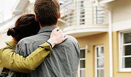 Couple looking at house