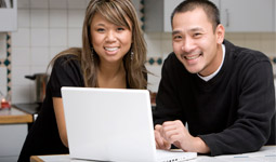 Couple at their computer