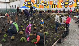 Families gardening at Fifth and Pine pop-up park