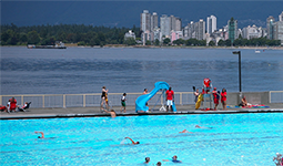 Swimmers and lifeguard at Kitsilano Pool