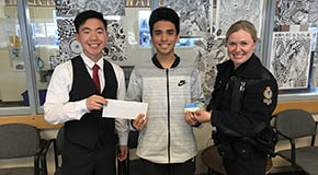 Positive Ticket recipient with a VPD officer