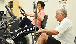 Two senior citizens exercising at a Park Board facility