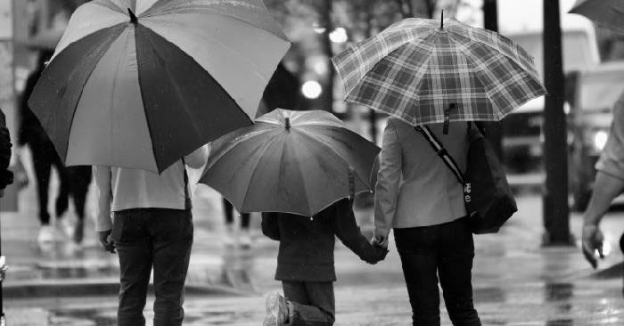 Family with umbrellas